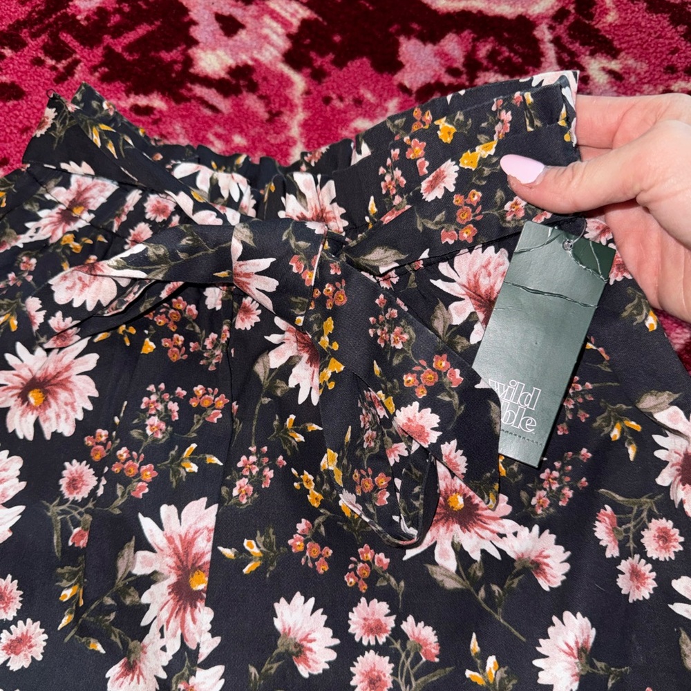 Floral Black shorts with tie belt.